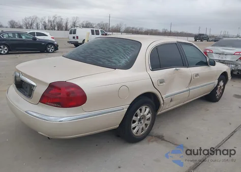 2000 Lincoln Continental z USA, uszkodzony, nr VIN 1LNHM97V3YY892072